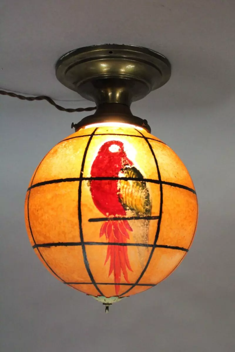 A close up of the lamp shade on a ceiling light