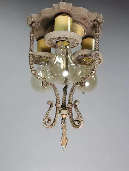 A chandelier hanging from the ceiling of a room.