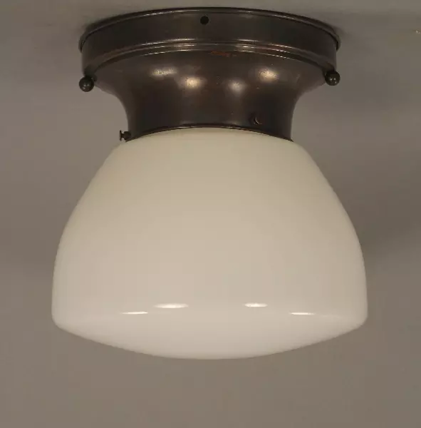 A close up of the ceiling light fixture