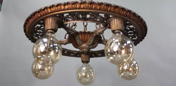 A close up of the light fixture in the ceiling.