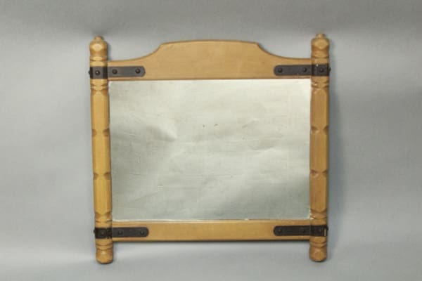 11506. Circa 1930's Rancho Monterey Period Mirror With Iron mirror with curved top and metal accents on a gray background.