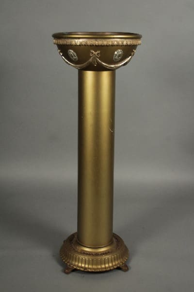 11931. 1920's Spanish Revival Tall Plant Stand with decorative motifs and fluted column, standing against a grey background.