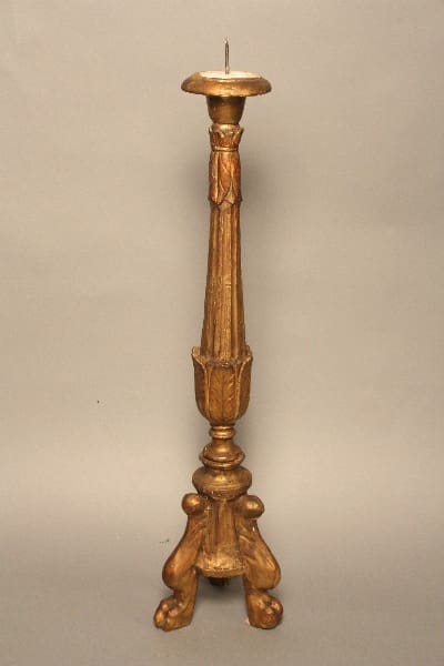 Antique 11978. Italian Carved Wood 19th Century Candleholder stand with intricate carvings and a three-footed base on a gray background.