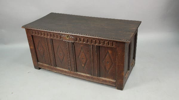 13425. Turn Of The Century Trunk with decorative front panels, positioned against a plain background.
