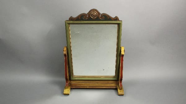13669. Signed Barker Bros Spanish Revival Mirror On Stand with ornate carvings and a faded green and gold finish, set against a neutral gray background.