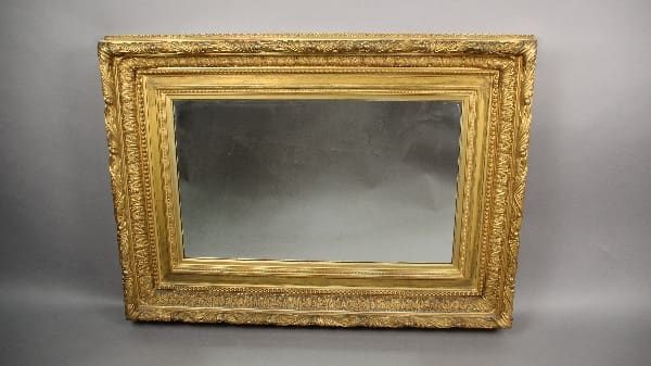 13687. Turn Of The Century Mirror With Gilt Frame with an empty gray insert displayed against a neutral background.