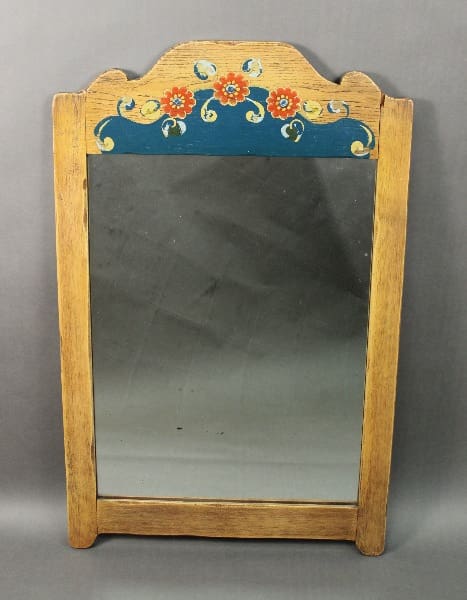 Vintage 14427. Monterey Period Mirror with a decorative floral pattern painted on its arching top, set against a plain gray background.