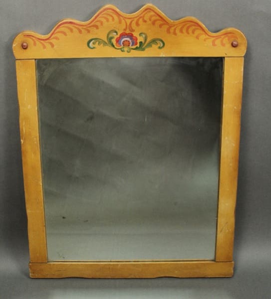 14429. Lovely Spanish Revival Hand Painted Mirror with decorative floral motifs on the frame, placed against a gray background.