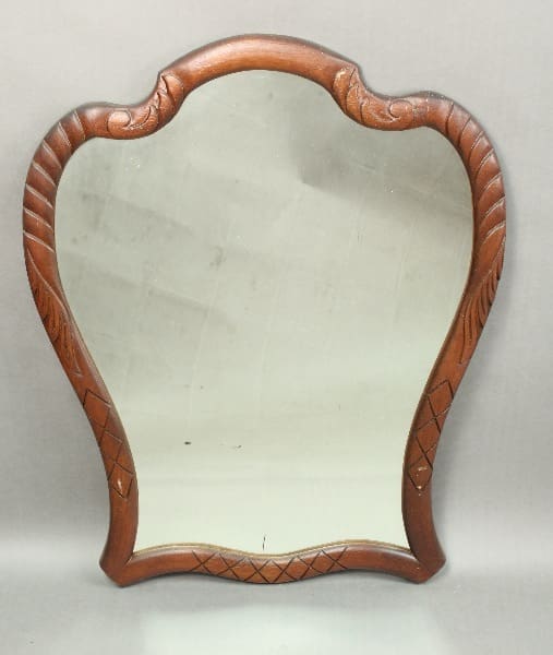 Antique 14435. Spanish Revival Scalloped Mirror with decorative geometric carvings on the frame, set against a plain gray background.