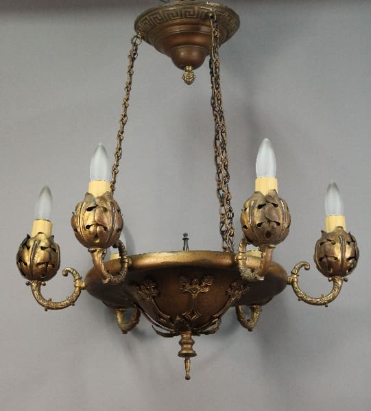 14872. Early 20th Century Chandelier With Acanthus Leaf Motif with five lights designed as candles, featuring ornate metalwork with floral motifs, hanging from a chain.