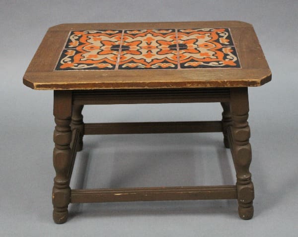 Antique wooden 15022. 1920's Early California Monterey Style Spanish Revival Tile Table with 6 Tiles table with ornate, multicolored ceramic tile inlay on the tabletop, supported by carved legs and a lower shelf.