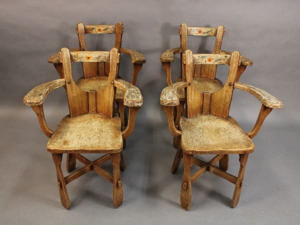 Four 15339. Set Of 4 Signed Coronado Chairs with floral patterns on the backrest and woven seats, arranged in pairs against a grey backdrop.