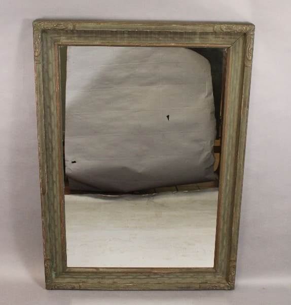 A damaged painting covered by a gray cloth is framed in the 15367. Large Scale Wood Carved Mirror, set against a plain background.