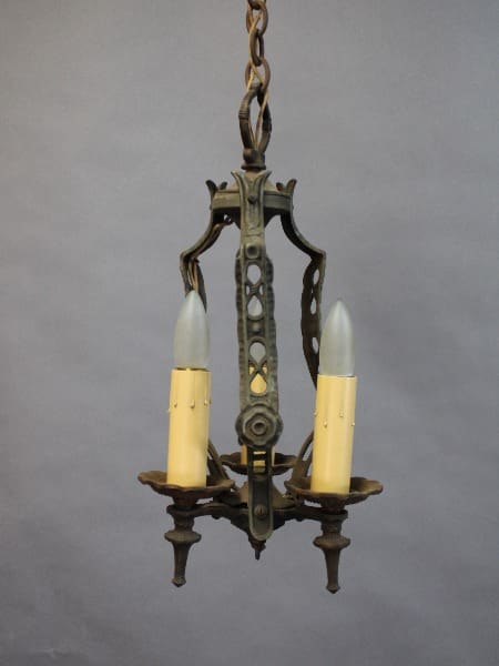 15382. Three Light 1920's Pendant with two candle-shaped bulbs, suspended by a chain against a grey background.