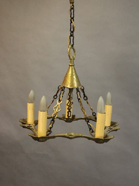 15388. Simple Brass Chandelier Circa 1920's with five candle-shaped bulbs, suspended by a chain against a neutral background.