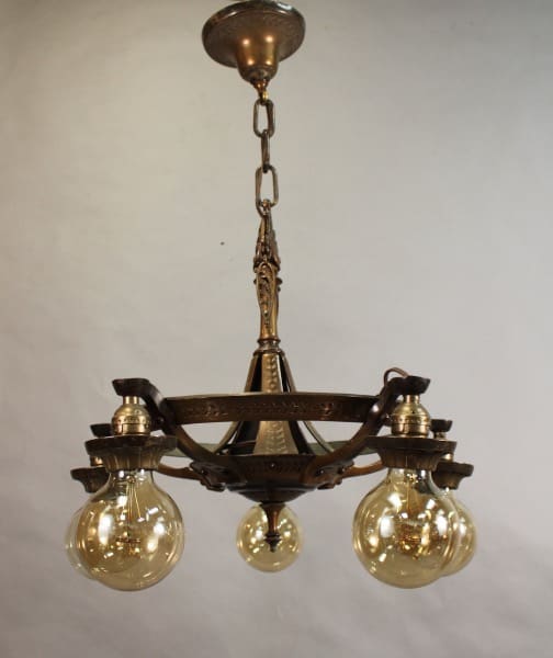 15505. Circa 1920's Downlight Chandelier With Cast Brass Construction with three illuminated bulbs, ornate details, hanging from a ceiling.