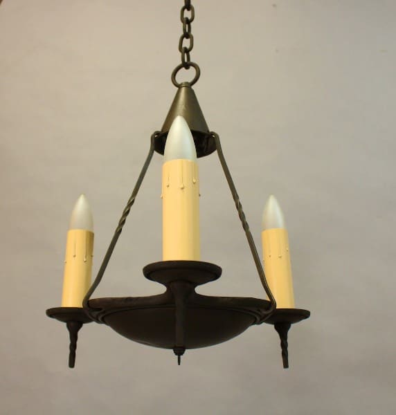 Antique 15546. Three Light Pendant Circa 1920's with three candle-shaped bulbs, suspended by a chain from a ceiling, against a neutral background.