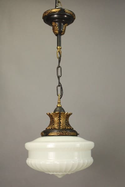 An antique 15725. 1920's Pendant With Acanthus Motif Fitter with ornate golden accents and a white frosted glass bowl, suspended by a chain against a neutral background.