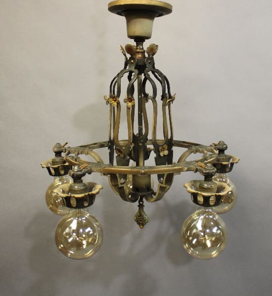 Sentence with product name: 15928. Original 1920's Ceiling Mount Chandelier With Down Lights with six arms and ornamental details, featuring three glass globes and floral accents against a neutral background.