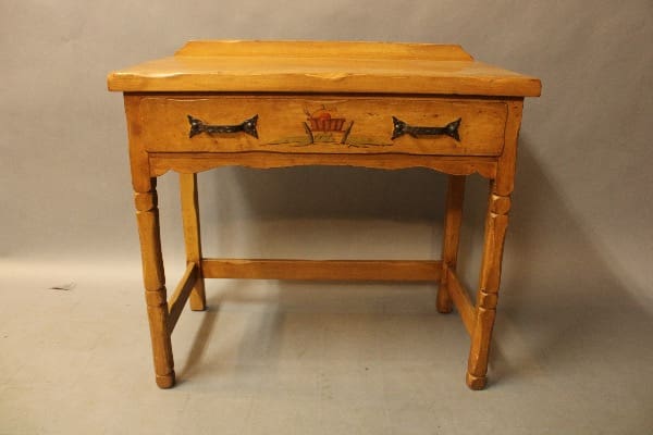 16340. Monterey Period Side Table With Painted Drawer with ornamental carvings featuring cat motifs and a basket design, set against a plain background.