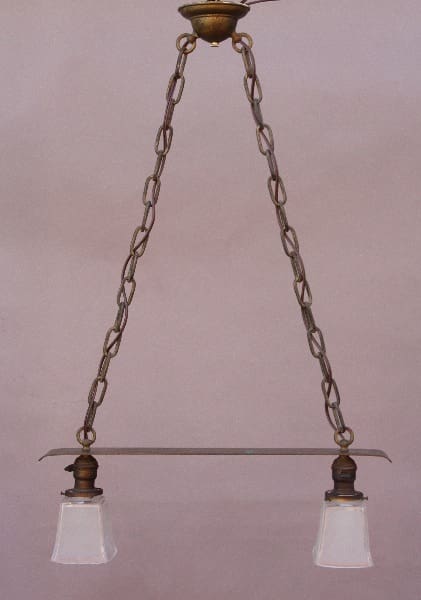 9759. Early 20th Century Copper Chandelier featuring a bar suspended by chains, with two downward-facing white glass shades.