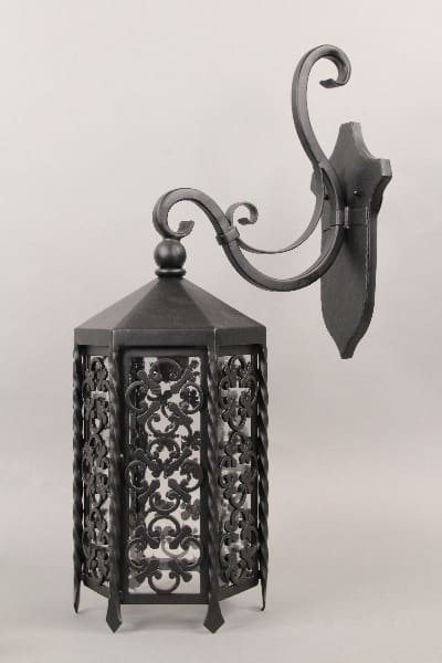 Ornate black metal wall mounted lantern.