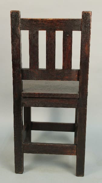 11457. Small Arts And Crafts Child Chair with vertical slats, dark brown finish, and a sturdy rectangular design.