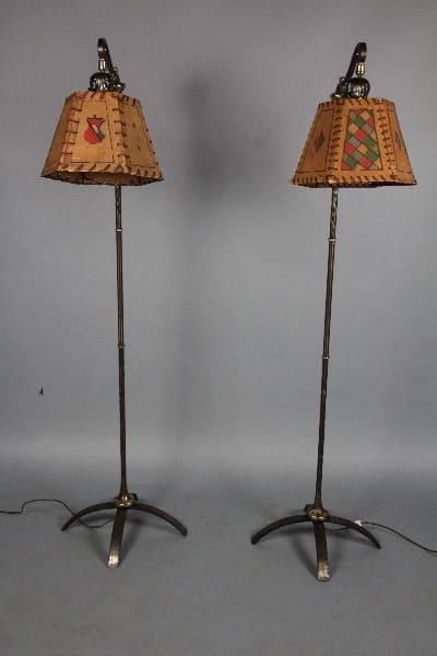 Pair of antique floor lamps with patterned shades.