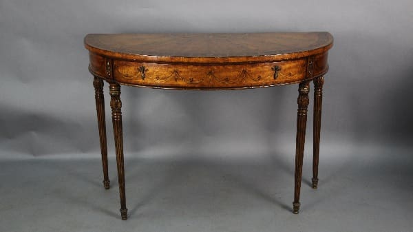 Antique 13125. 19th Century Demi Lune Table with Inlay console table with floral inlay and tapered legs, displayed against a gray backdrop.