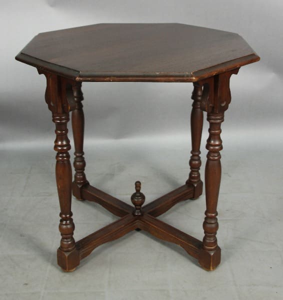 Antique wooden 13172. 1920's Walnut Octagonal Table with turned legs and cross-braced base, photographed against a gray background.