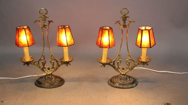 Two Pair Of 1920's Table Lamps With Mica Shade, set against a plain backdrop.
