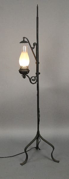 Vintage-style floor lamp with glass shade.