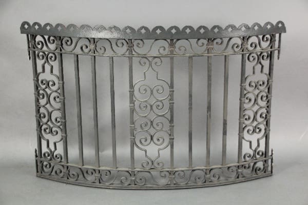 Decorative wrought iron fence panel design.