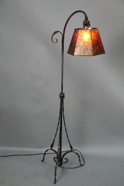 Decorative metal floor lamp with shade.