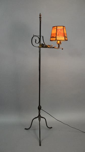 Ornate floor lamp with patterned shade.