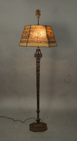 Vintage floor lamp with decorative shade.