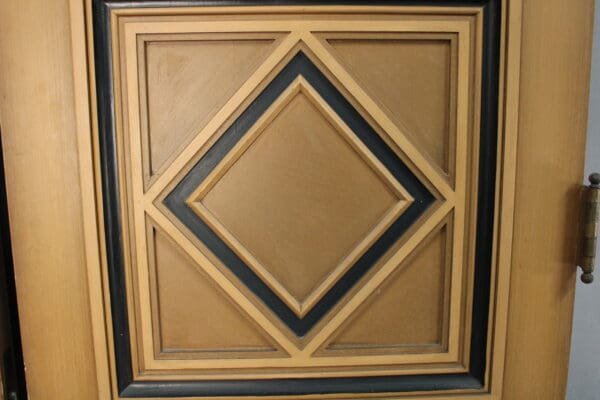Close-up of a 14016. Pair Of Fantastic Double Doors From 1920's Spanish House featuring a geometric diamond design with contrasting black trim.