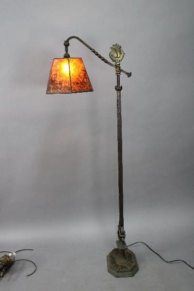 Vintage floor lamp with decorative shade.