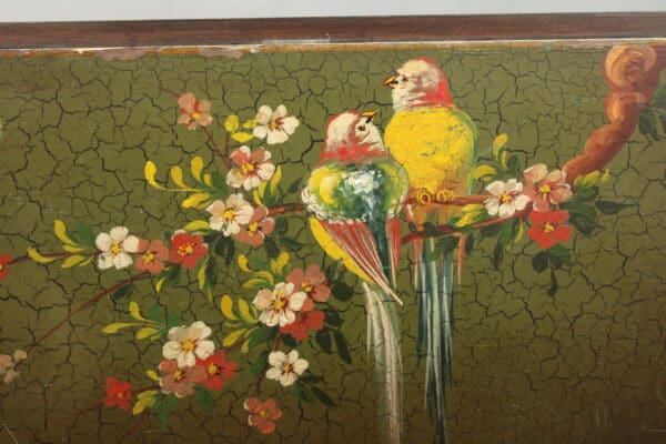 14496. 1920's Hand Painted Bar Cart With Bird Motif of two colorful parrots perched on a branch with white flowers, set against a cracked green background.