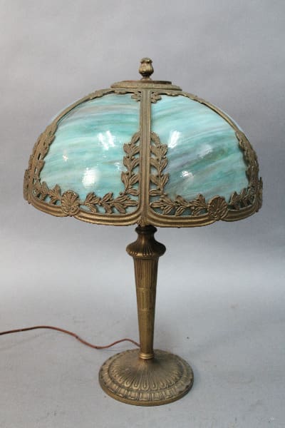 14996. 1920's Table Lamp With Beautiful Bluish Shade standing on a gray surface against a neutral background.