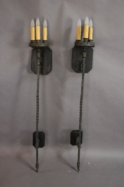 Pair of vintage wall sconces with candles.