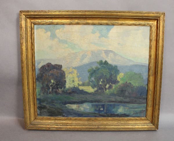 Landscape painting with trees and a pond.