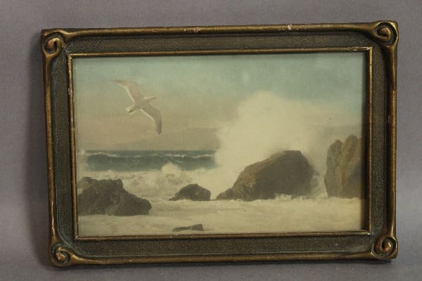 Seascape with waves and flying seagull.