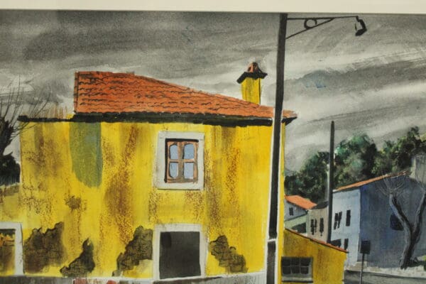Yellow house under a gray sky.