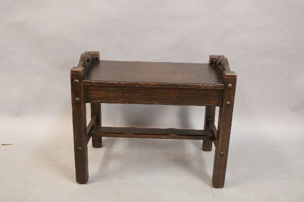 Wooden stool with a simple design.