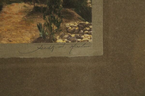 Artistic signature on a textured background.