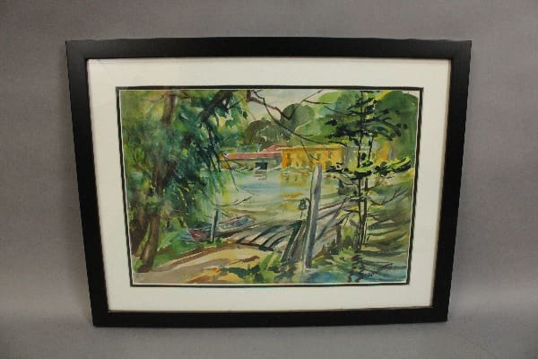 Framed watercolor painting of a serene landscape.