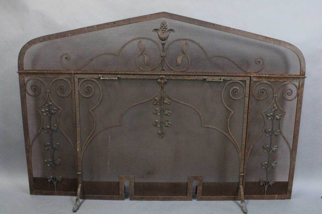 15334. Beautiful Large Scale Peaked Firescreen with decorative scrollwork and floral designs, featuring a gently curved top and three supporting feet