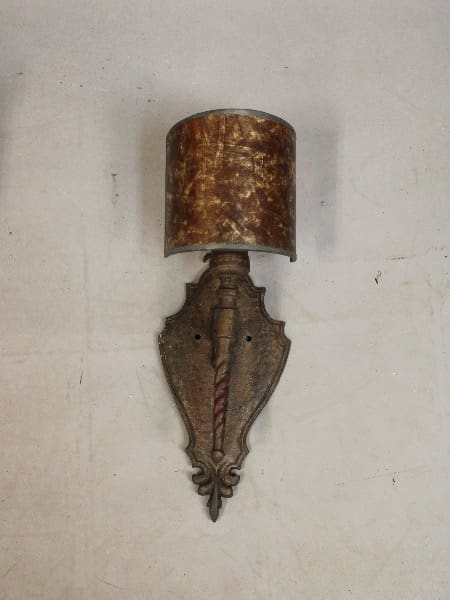 Wall sconce with a brown shade.