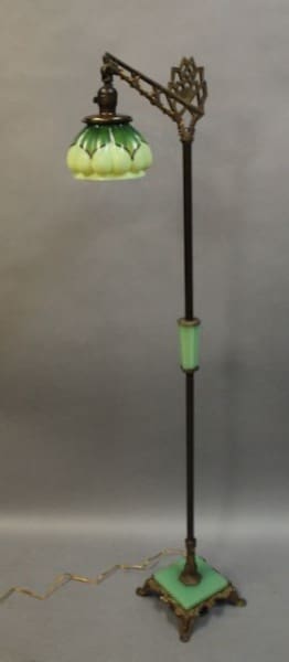 16155. Circa 1920's Bridge Lamp With Green Glass Shade with ornate metal base, standing against a neutral background.